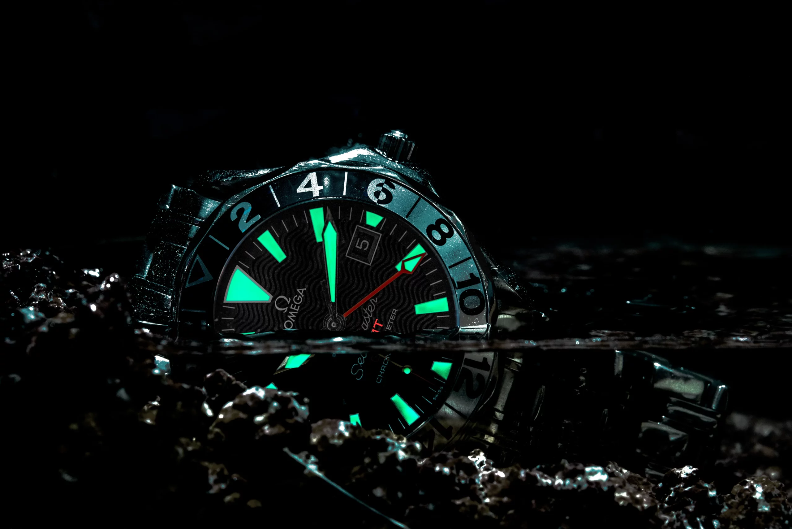 Waterproof Watch: A watch submerged in water, showcasing its water-resistant capabilities.