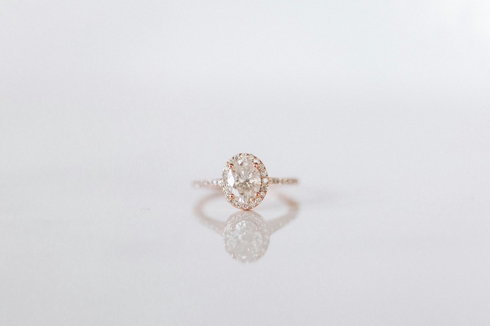 a diamond ring on a white background