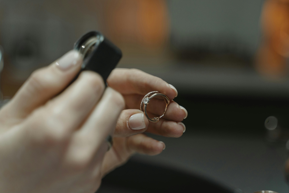 a jeweller appraising a ring