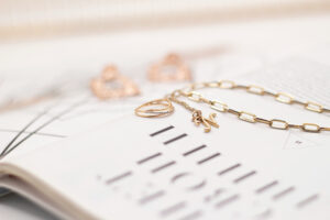 jewellery choices laying on a white book